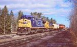 CSX C40-8W 7700- LRCX ex-Santa Fe SF30-C 9532, is about to head south on the Wisconsin Central at South Itasca, Wisconsin. April 9, 1999. 